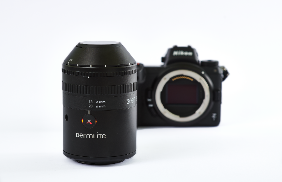 DermLite Foto II Pro dermatosocpe in the foreground with camera in the background.