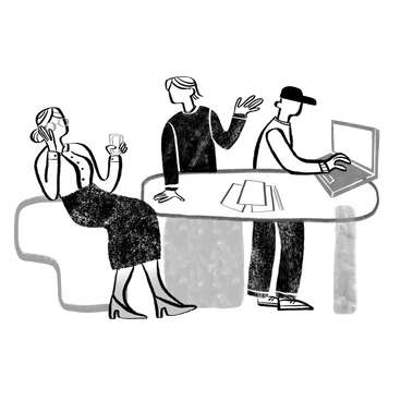 Group of colleagues working together in a shared workspace