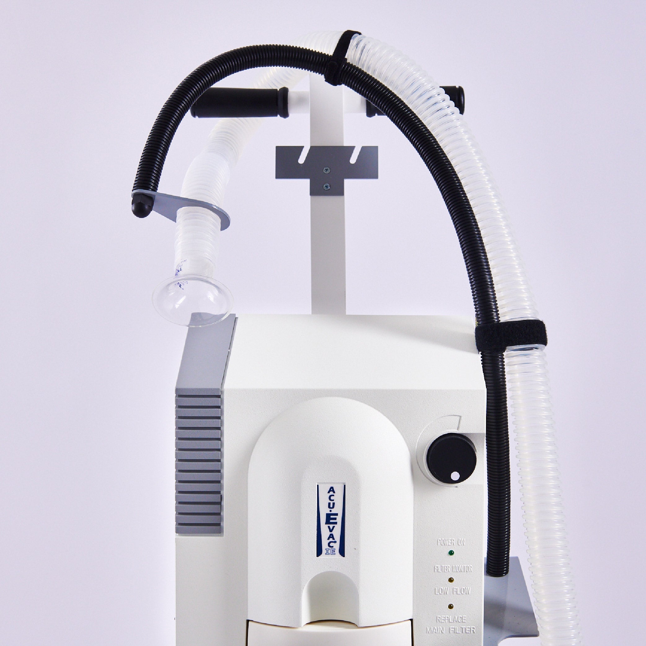 Close up of AcuEvac fitted on a portable trolley with all accessories.