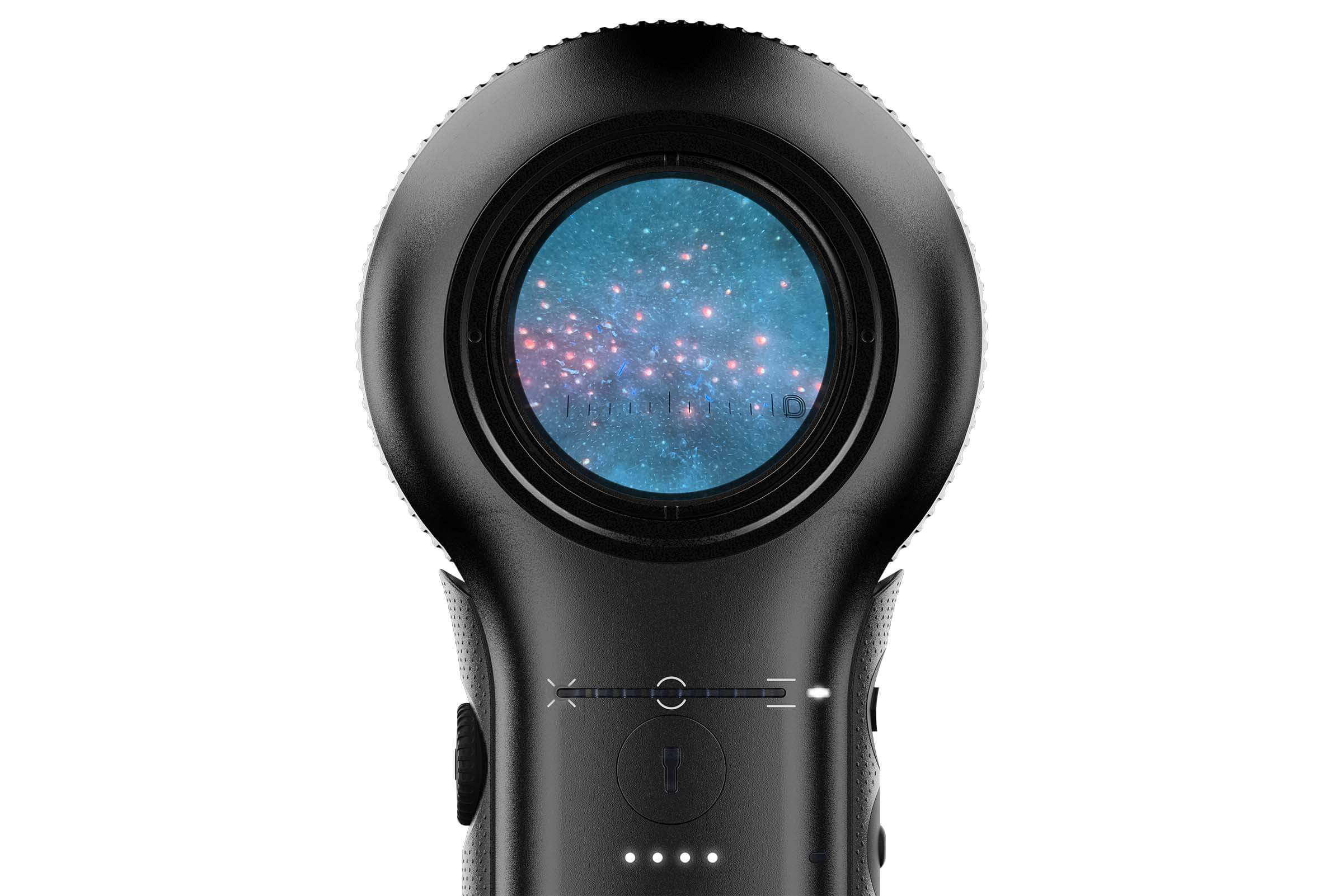 DermLite DL5 dermatoscope viewing a lesion with UV light.