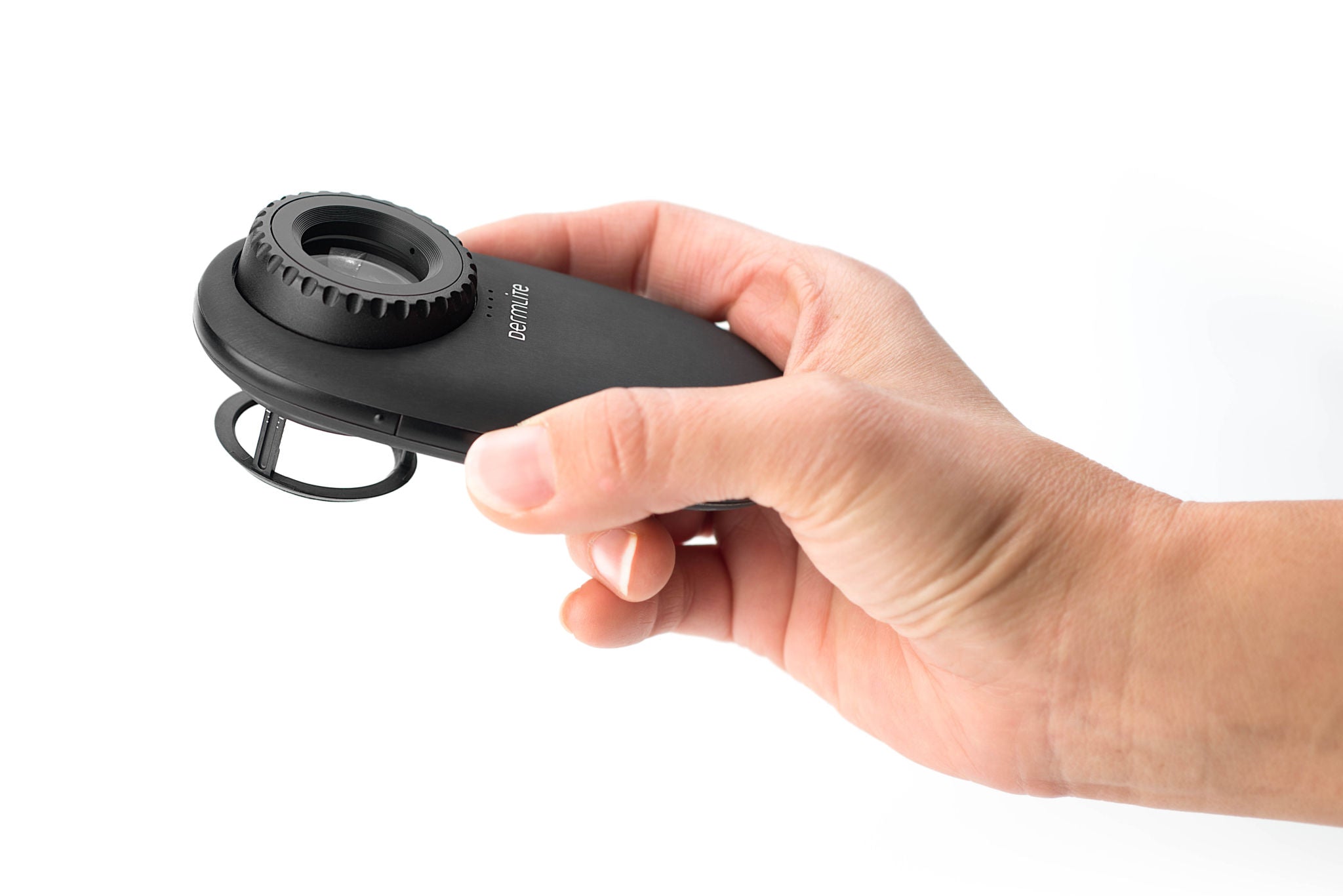 Hand holding the DermLite DL200 HR dermoscopy device