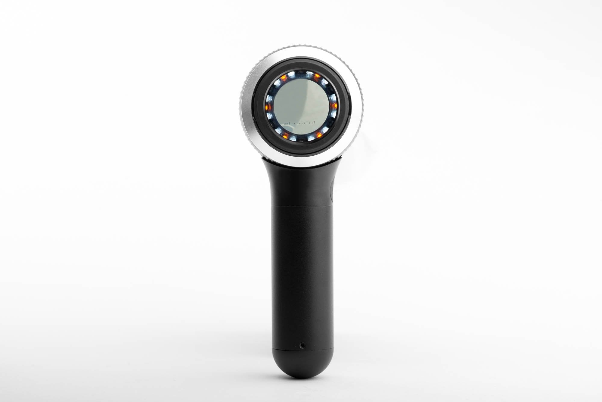 DermLite DL4 dermatoscope showing Pigment Boost Plus.