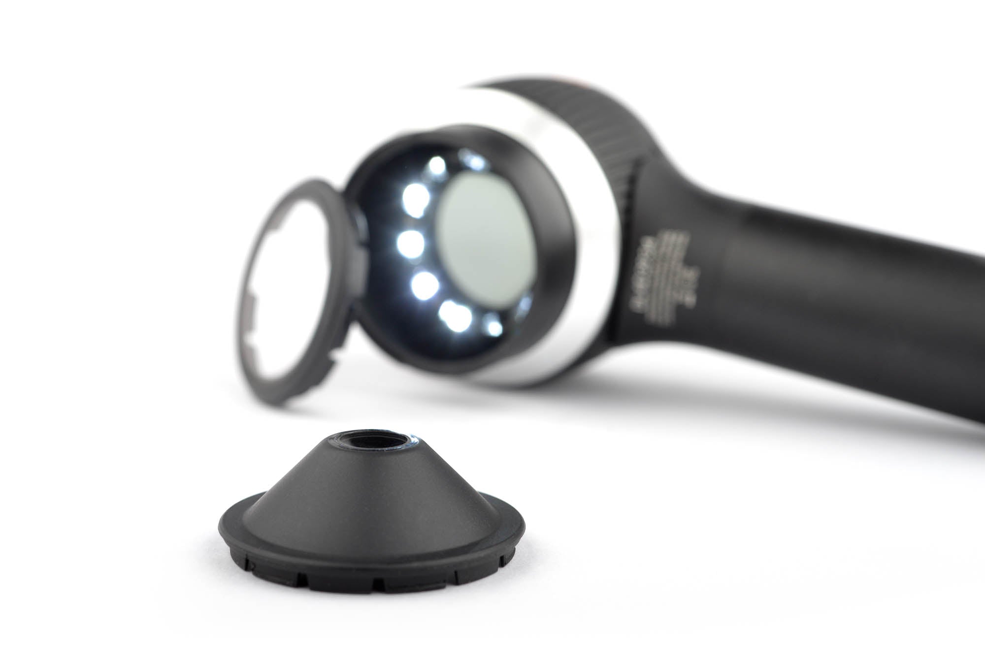 Small area contact plate alongside DermLite DL4 dermatoscope.