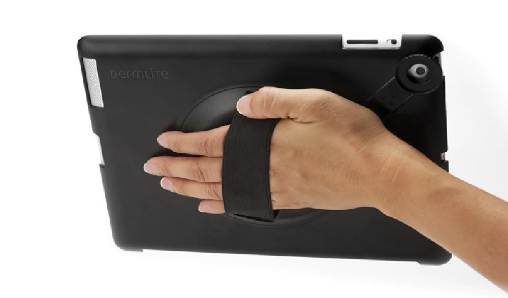 Hand holding DermLite connection kit for iPad