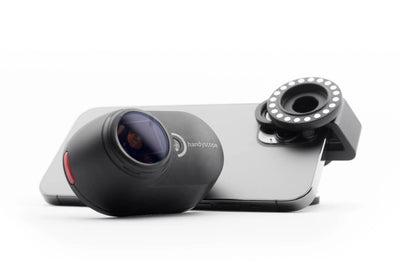FotoFinder DermLite Handyscope next to phone