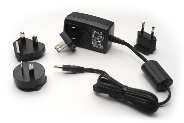 DermLite DL3N charger with various adapters.